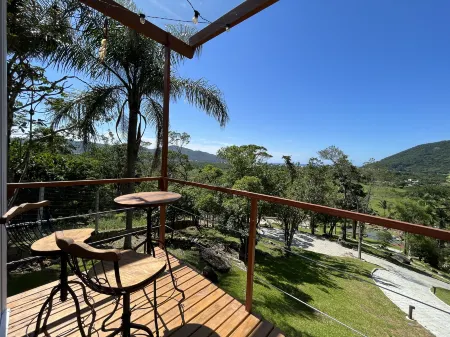 Casas de Vidro - Hospedar com Propósito Отели рядом с достопримечательностью «Lagoinha do Leste»