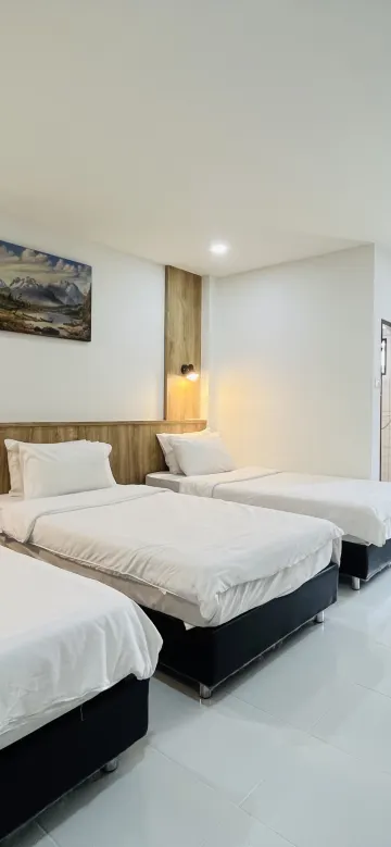 ห้องสำหรับสามท่านพร้อมเตียงเดี่ยว 3 หลัง