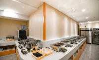 Urban Garden Hotel (Penglai Pavilion Street Dengzhou Road Market) - فطور