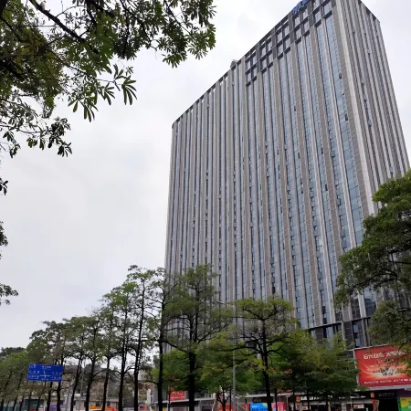 Yuyu International Apartment (Jiangnanxi Jiangtai Road Metro Station Branch) Отели рядом с достопримечательностью «Стадион «Яньцзыган»»