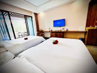 Green Hot Spring Homestay (Gupo Mountain Tourism Resort Distribution Center Branch) - balcony