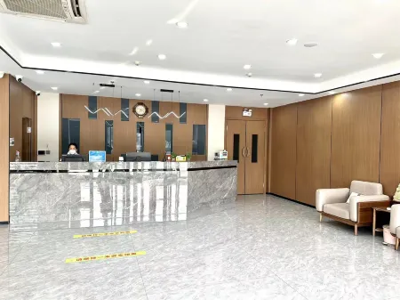 Yuehe Hotel Zaozhuang Отели рядом с достопримечательностью «Guanshi Durian Garden Tourist Resort»