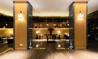 Maison New Century Hotel Lu'an