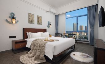 Shuangyue Bay Wotu Seaview Holiday Hotel - Housity