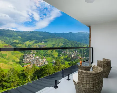 논의 파노라마 전망을 즐기세요 (룽성 룽지 계단식논 지점) 룽성 호텔