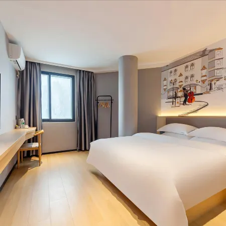 Jinhao Hotel (Longyandong Station) Отели в г. Лунянь