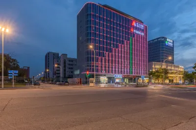 廣州希曼國際公館（中新廣州知識城紅衞地鐵站店） 鄰近洪卫的酒店