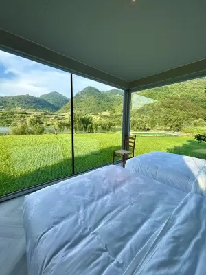 Ma Jiangtian Bibian Creek wild holiday camp فنادق في ماجيانغ