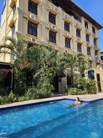 Golden Tulip Stone town Boutique Отели рядом с достопримечательностью «Персидские бани Хамамни»