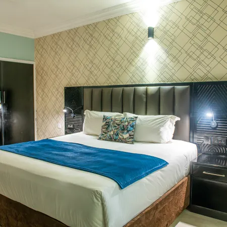 New Ambassador Hotel Отели в г. Хараре