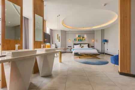 Yueqi Theme Hotel Отели в г. Синжэнь