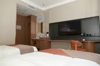 QI  MAN  HOTEL