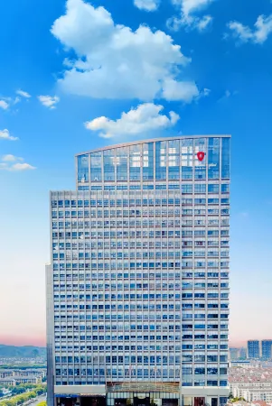 ROSSO HOTEL MUDU Отели рядом с достопримечательностью «Suzhouhuashanziran Sceneic Area»