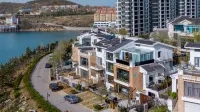 Floral Hotel· Pinghuai Homestay (Grape Beach Sea Bath Shop) Hotel di Weihai