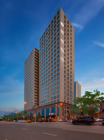 Xinzhou CLEAN HOTEL Отели рядом с достопримечательностью «Xiurong College»