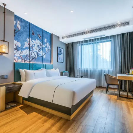 Magnolia Hotel (Qizilou Branch, Lishui University)