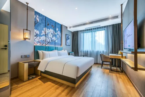 Magnolia Hotel (Qizilou Branch, Lishui University)