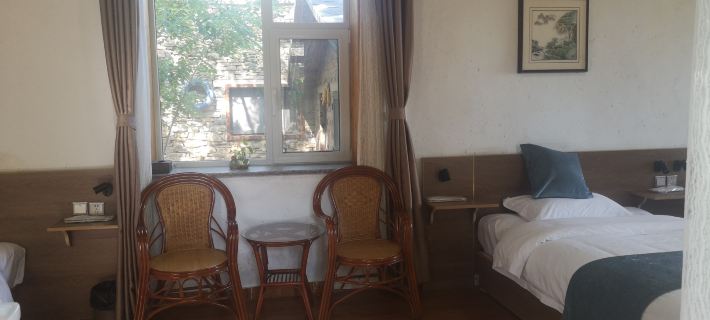 Zhangpingwa Laojing Impression Homestay Hotel a Xintai