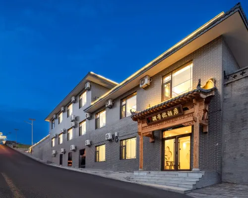 Wang Family No. 8 Courtyard Homestay (Wang Family Courtyard Ticket Office) 링스 호텔