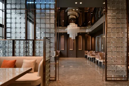 Meilan Premier Hotel Отели рядом с достопримечательностью «Jinyang Ancient City Relic Site»