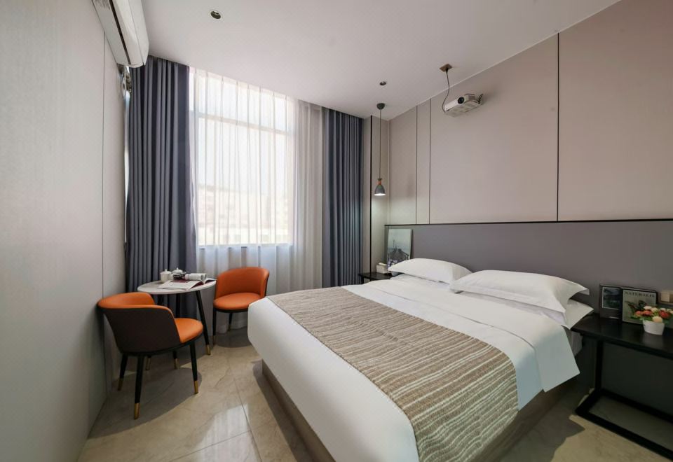 [샤먼 뷰티풀 호텔의 깔끔한 객실 인테리어 이미지]