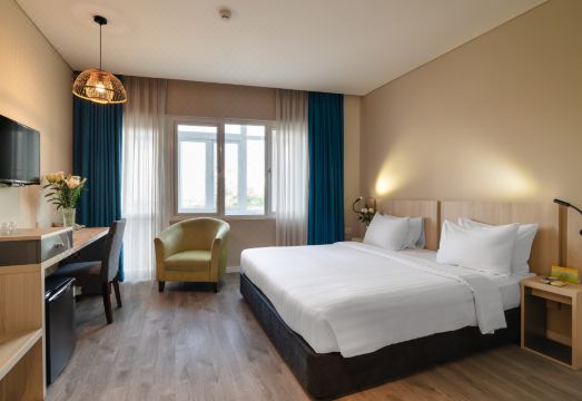 리버티 호텔 사이공 그린뷰의 조식 뷔페 또는 객실 내부 이미지