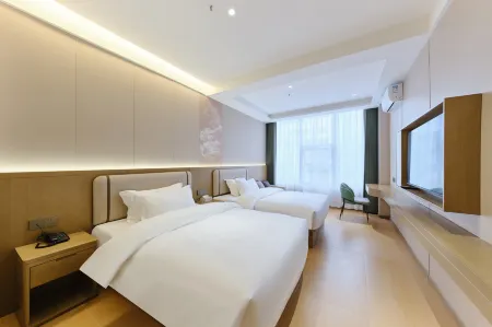 Yiduo Hotel (Dazhou Luofu Plaza Railway Station) Отели рядом с достопримечательностью «Sichuan University of Arts and Sciences (Lianhu Campus)»