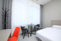 Mango Boutique Hotel (Song County Baiyun Avenue) فنادق في مديرية سونغ