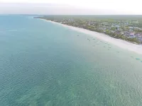 Uroa Beachfront 2BR • Balcony • Free Wi-Fi