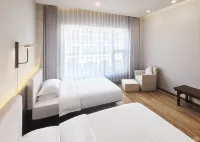 Litang Huaxi Yungu Hotel (Ririjia Village)