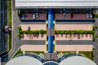 Xuancheng Wanlinghu Ecological Park Hotel - Parkplatz