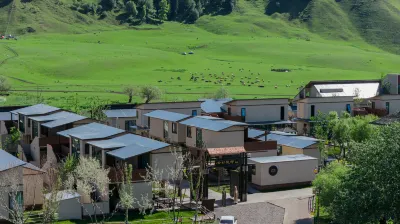 Trip.com Group Country Retreats (Nalati Spruce Hidden Lodge Joint Resort) Hotels in Xinyuan