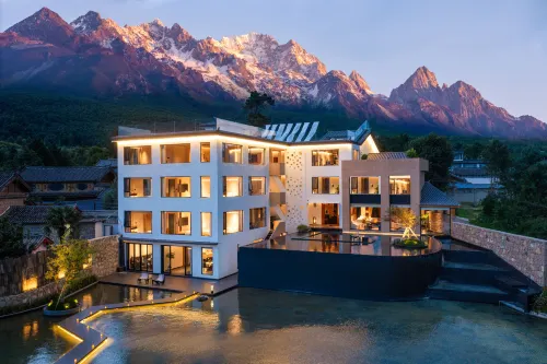 Qiwu Lan KIOWLAN Snow Mountain Retreat Manor - bar