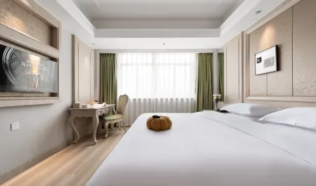 Four Seasons Fashion Hotel (Yongkang South Railway Station Xijinqiao Pedestrian Street) Отели рядом с достопримечательностью «Wujincheng Square»