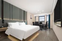 New Beacon International Hotel (Gedian South Station Gaoxin Avenue) Отели рядом с достопримечательностью «Heshangshan Relic Site»