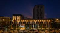 Interstellar Mei Gao Hotel Озеро Dishui и район Lin'gang: отели