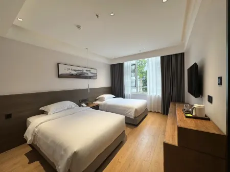 TRAVEL TREE INN Отели рядом с достопримечательностью «Gong Amusement Park»