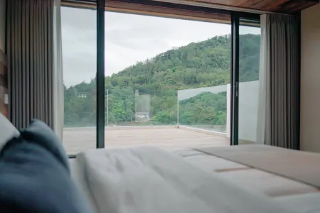 Pure Cloud Hotel Отели рядом с достопримечательностью «Jiulao Cave»