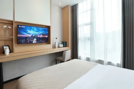 Guangzhou Jiulong Hotel (Zheng'an County Government Branch) Отели в г. Чженгань