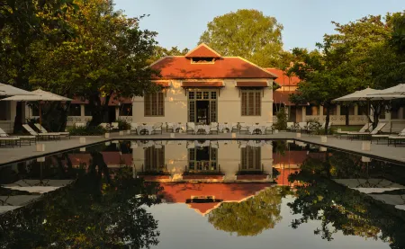 Amantaka Отели рядом с достопримечательностью «Wat Xieng Muan»