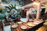 Half Moon Village and Beach House Hotels in Lian