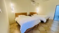 Juyou Homestay Hotel in zona Longjingzhen Shikan Passenger Transport Terminal