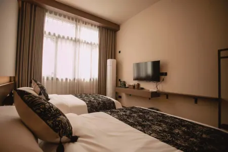 Yun She Designer Minimalist Family Vacation Homestay (Border Town Tea Cave Scenic Area Branch)