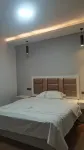 Qujing Zhouzhou Theme Hotel - 2 tähden