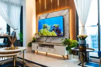 Aina Residency Beachfront Hotel
