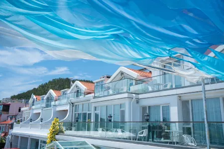 Xiehou Garden Hotel (Laoshan Scenic Area Liuqinghe Beach Branch) Отели рядом с достопримечательностью «Laoshan Taiqing Palace»