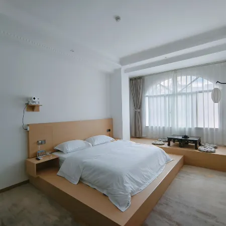Mengzi Hexinyuan Hotel (Wencui Road Branch)