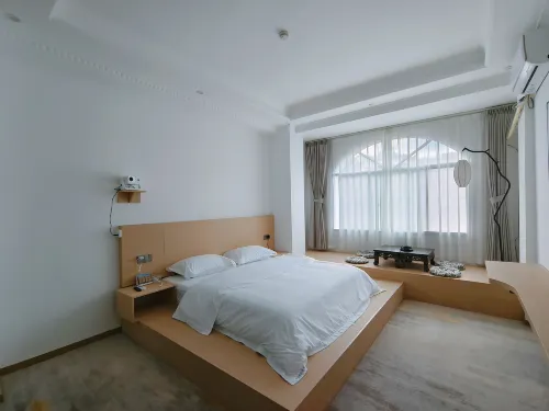 โรงแรมเหอซินหยวน เหมิงจือ (สาขา ถนนเหวินชุ่ย)