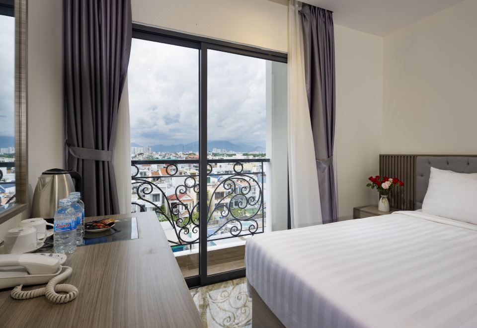 펄 시티 호텔 나트랑의 깔끔한 객실 내부 이미지