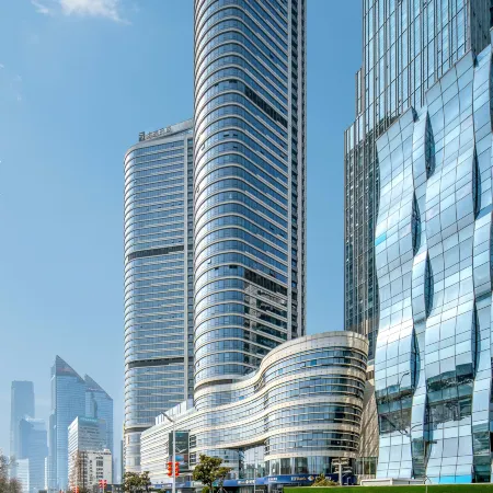 Haiyi International Apartment Отели рядом с достопримечательностью «Циндао-Восточный Университет»
